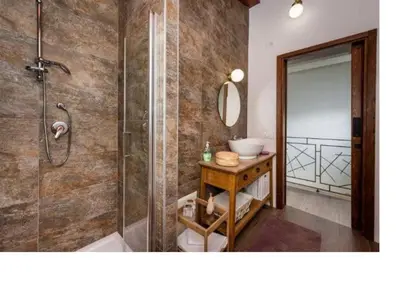 a bathroom with a shower and a sink at Villa Mirò in Castellammare del Golfo