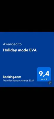 a cell phone screen with a blue text box at Holiday mode EVA in Partinico