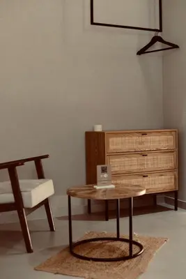 a living room with a table and a dresser at Palermo Inn Collection - Boutique Art Hotel in Palermo