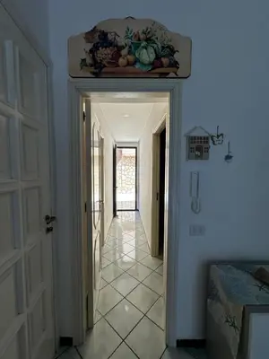 a hallway with a door leading into a room at AMATI HOLIDAYS in Palermo