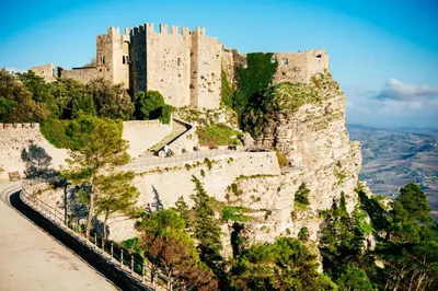 a castle on top of a mountain at Il Girasole del Centro Storico in Alcamo