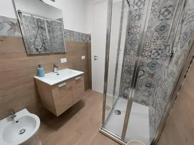 a bathroom with a shower and a sink at Al cortiletto in Castellammare del Golfo