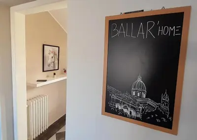 a sign for a hallway with a drawing of a building at [TERRACE WITH VIEW] Attic in old town BallarHome in Palermo