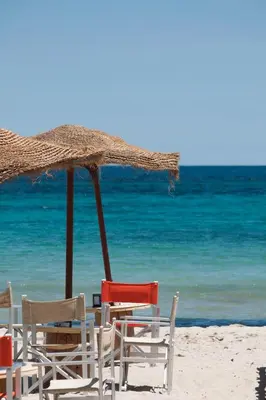 a man in a kayak in the ocean at B&B Rodionoff Palermo View & Terrace Mondello-Airport Link in Palermo