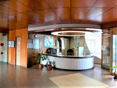 a lobby with a counter in a building at Residence _Capo Gallo in Palermo