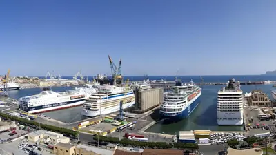 a group of cruise ships docked in a harbor at Lilibet Apartment in Palermo