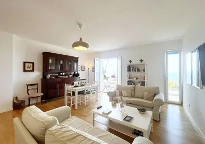 a living room with a couch and a table at Solemar Sicilia - Villa delle Rocce in Bagheria