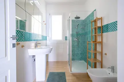 a bathroom with a sink and a shower at Solemar Sicilia - Villa delle Rocce in Bagheria