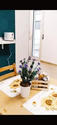 a potted plant sitting on a table in a room at B&B VENTO DEL SUD in Palermo