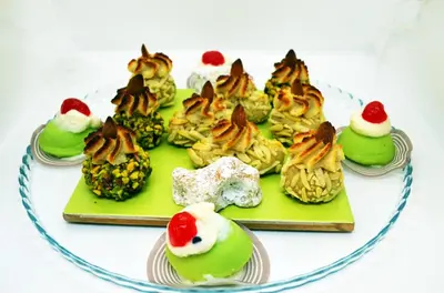 a plate of food with different types of desserts at B&B Casa Canali in Palermo