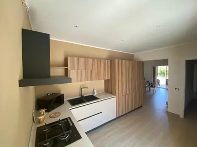 a kitchen with a sink and a counter top at Villa del Principe in Carini