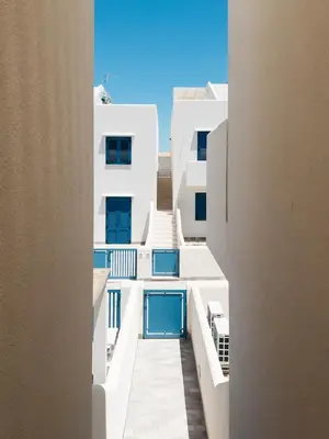 a view from a balcony of a building with a swimming pool at Savoia's apartments in San Vito lo Capo