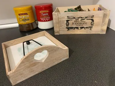 a wooden box with a heart in it on a table at Zanclea in Palermo
