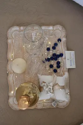 a tray with beads and other items on it at Terra Sinus Luxury apartment in Terrasini