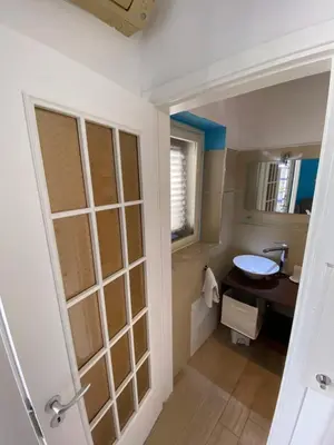 a bathroom with a sink and a mirror at Casa vacanze stella marina in Trappeto