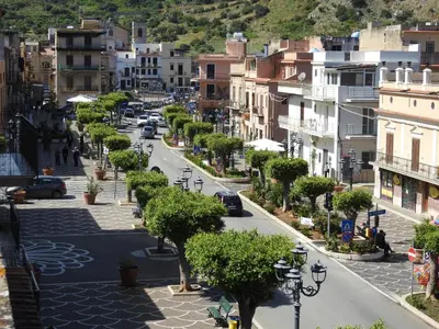 a street in a city with buildings at Leonardo in Capaci