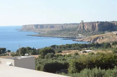 a view of a body of water from a hill at I colori del mare in Macari