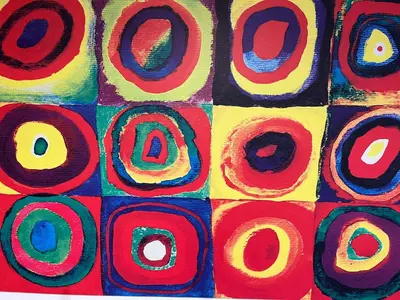 a close up of a painting withcolored circles at Un Raggio di Sole al Massimo in Palermo