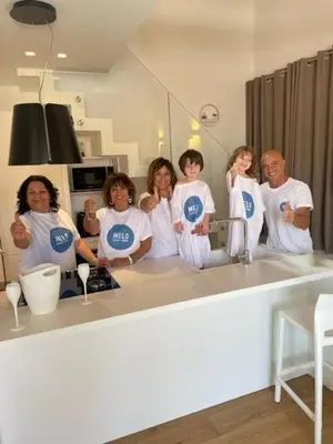 a group of people standing in front of a sink at meloluxuryhouse in Palermo