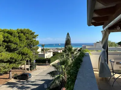 a view from the balcony of a house with a car at Hotel Iride by Marino Tourist in San Vito lo Capo
