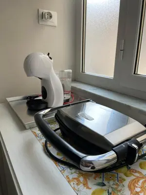 a hair dryer sitting on top of a counter at A casa da Carlo in Palermo