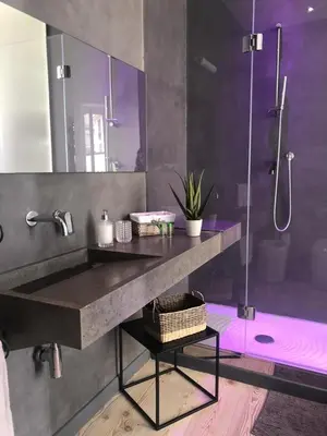 a bathroom with a sink and a shower at Maison Opéra in Palermo
