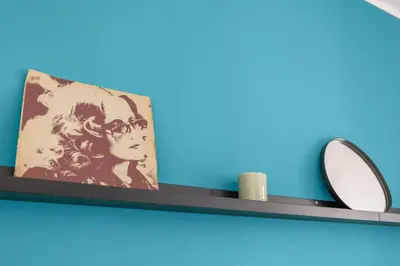 a shelf with a picture and a mirror on it at Suk Ballarò in Palermo