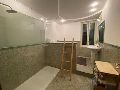 a bathroom with a ladder and a sink in it at Sampolo70 - Apartments in Palermo