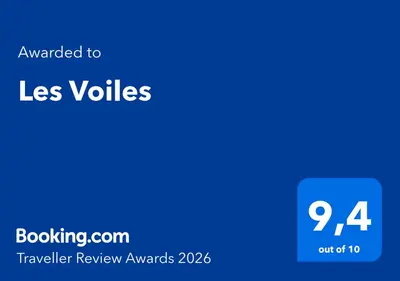 a blue screen with the text awarded to las values at Les Voiles in Terrasini