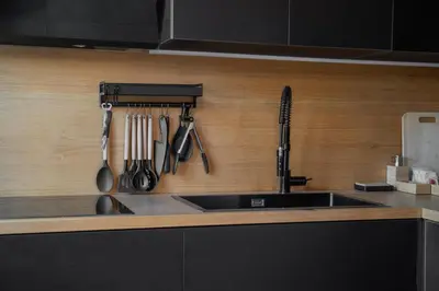 a kitchen counter with a sink and utensils at Politeama Centre in Palermo