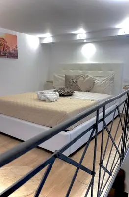 a large bed in a room with at A casa di ilary in Palermo