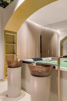 a room with a pool table and two trash cans at Aquasuite - Luxury Experience & Spa in Palermo