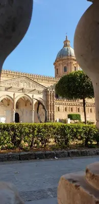 a large building with a dome on top of it at I Vicini del Re Holiday Home in Palermo