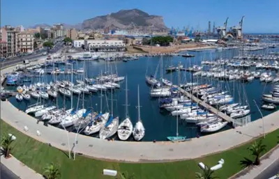 a marina filled with lots of boats in the water at Casa Dadà, romantic house in historic centre in Palermo