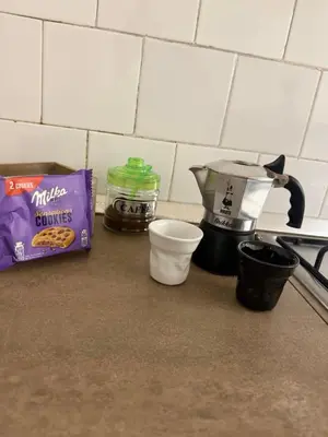 a counter top with a blender and other kitchen items at Casetta Mape in Palermo