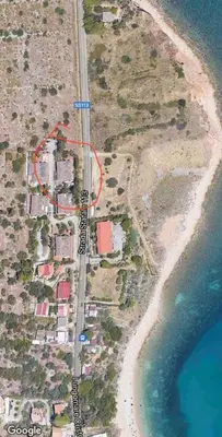 an aerial view of a beach with houses and the ocean at Villa's apartment on the beach, swimming pool A/C in Palermo