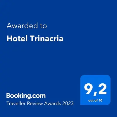 a blue screen with the text awarded to hotel timtararia at Hotel Trinacria in Palermo