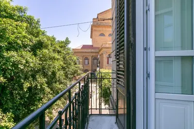 an external view of a building from a balcony at GuestHost - Teatro Massimo Bright and Cozy Apartment in Palermo