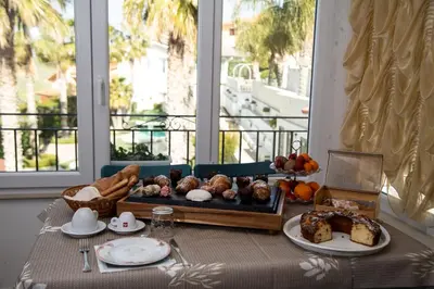 a table with a tray of food on top of it at Leon D'Oro in Corleone