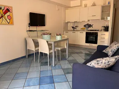 a kitchen and dining room with a table and chairs at Casa Dorotea in Nuova Gibellina
