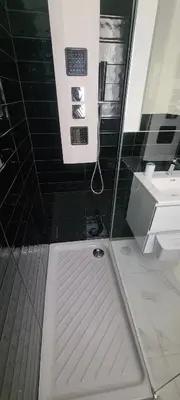 a bathroom with a shower with a sink and a toilet at Casa Cristy palermo in Palermo