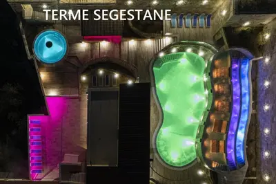 a stage with a green and purple slide in a building at Le Plejadi in Castellammare del Golfo