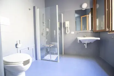 a bathroom with a toilet and a sink at Le Plejadi in Castellammare del Golfo