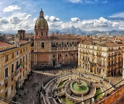 an aerial view of a city with a clock tower at Sofia Holiday Home in Palermo