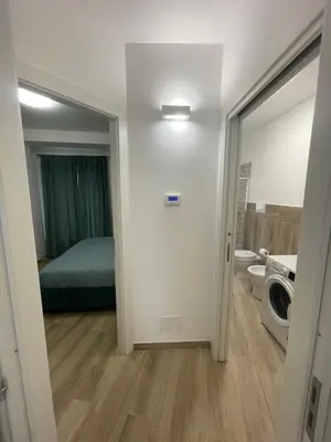 a room with a bathroom with a bed and a toilet at Casa Himera Palermo in Palermo