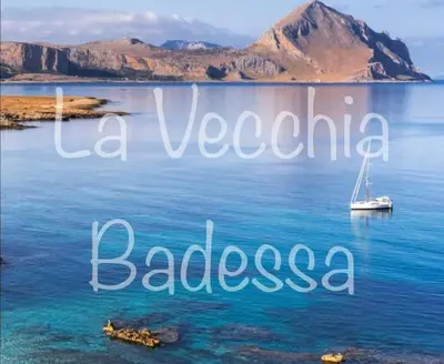 a view of a lake with a boat in the water at La vecchia Badessa a due passi dal mare in Macari