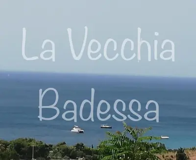 a view of a bay with boats in the water at La vecchia Badessa a due passi dal mare in Macari