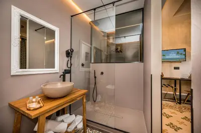 a bathroom with a sink and a shower at Art e Dimora - Boutique Room. in Castellammare del Golfo