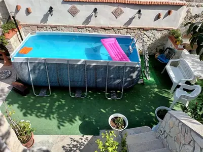 an overhead view of a swimming pool in a backyard at Aromi di Sicilia Casa Vacanze in Palermo