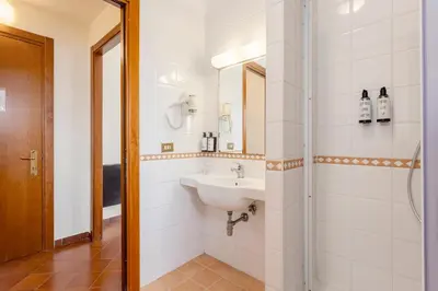 a bathroom with a sink and a mirror at Crisol Europa in Palermo